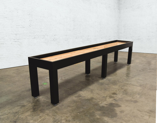 The Buckhead Shuffleboard Table by Venture is a handcrafted Parsons-style shuffleboard, blending modern elegance with tournament-quality play. Built in the USA with a solid hardwood cabinet, this sleek design is available in black, grey, and white finishes, perfect for contemporary game rooms, high-end lounges, and designer spaces.