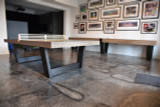 The Monaco Luxury Ping Pong Table seamlessly integrates into a high-end game room. Its contemporary silhouette, solid Ashwood build, and professional-grade playfield make it a centerpiece for competitive play and refined interiors alike. A must-have for those who appreciate design-driven gaming experiences.