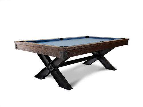 The Portland Slate Pool Table by Nixon Billiards is displayed at a ¾ angle, showcasing its rustic hardwood cradle and industrial matte black X-style steel legs. This clean white background image highlights the table’s bold silhouette and upscale materials, exclusive to SawyerTwain.com.