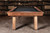 Add the perfect centerpiece to your modern game room or residents' lobby with the Marvin Muse Pool Table. Designed by Doc & Holliday Billiards, made in the USA, and featuring a contemporary aesthetic with sleek, tapered legs, it’s the ideal choice for high-end interior design in any luxury space.