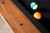 Customize your Marvin Muse Pool Table with a range of hand-selected wood finishes, crafted in the USA by Doc & Holliday Billiards. Choose the perfect finish to match your home or commercial space, from sleek modern to traditional designs that suit your unique style.