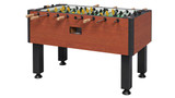 Tornado Elite Foosball Table in Victorian Cherry finish shown at a three-quarter angle, highlighting the premium cabinet and heavy-duty rods.