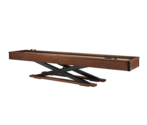 American Heritage Quest Shuffleboard Table in Navajo finish shown at a ¾ front angle on white background, featuring steel X-legs and rich dark wood frame.